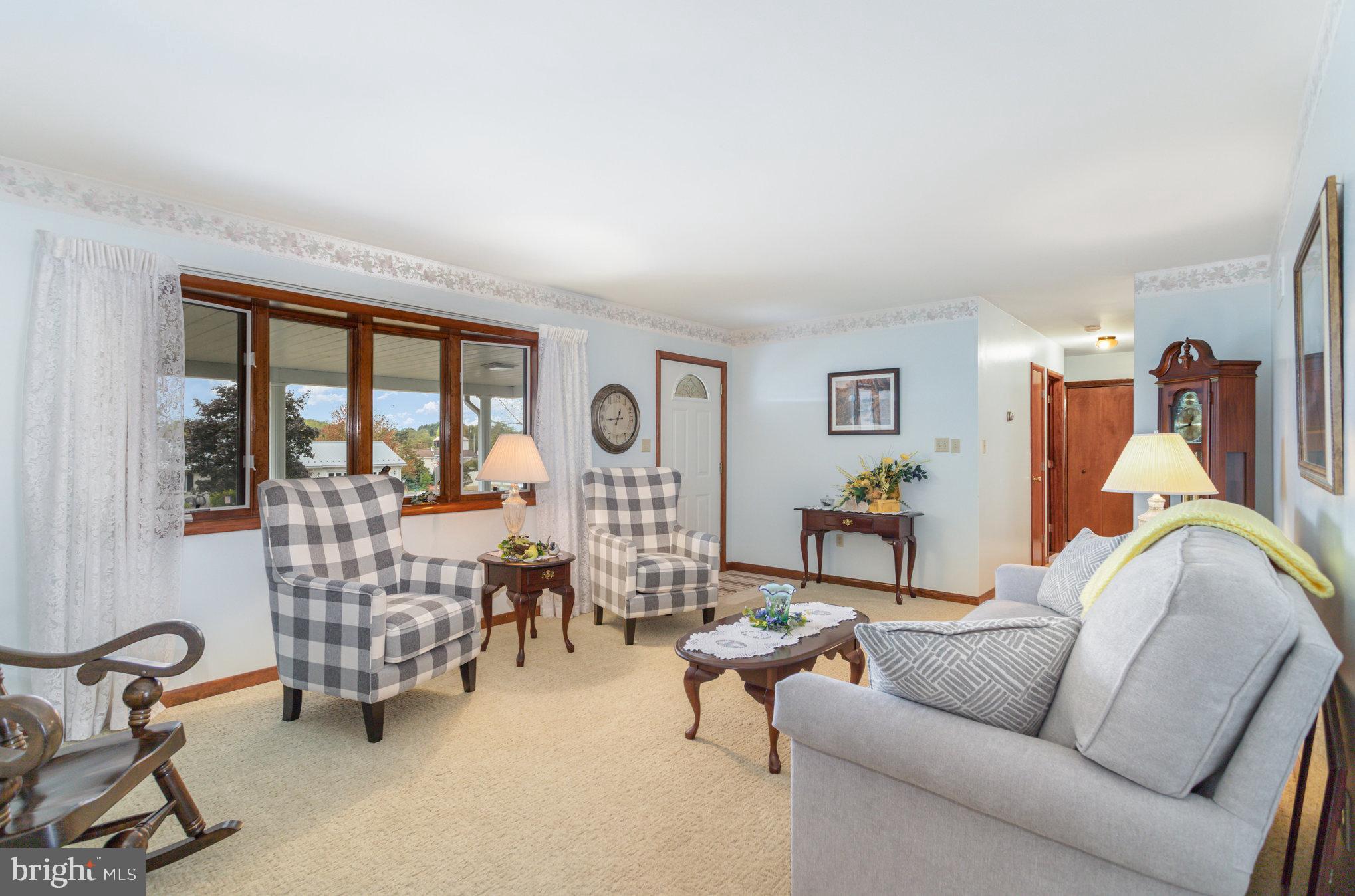 29 Robin Circle Halifax, PA 17032 - Photo 8 of 35 a living room with furniture and a large window