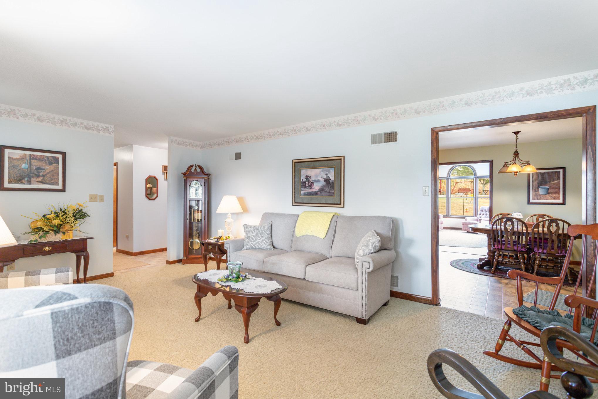 29 Robin Circle Halifax, PA 17032 - Photo 9 of 35 a living room with furniture a couch and wooden floor