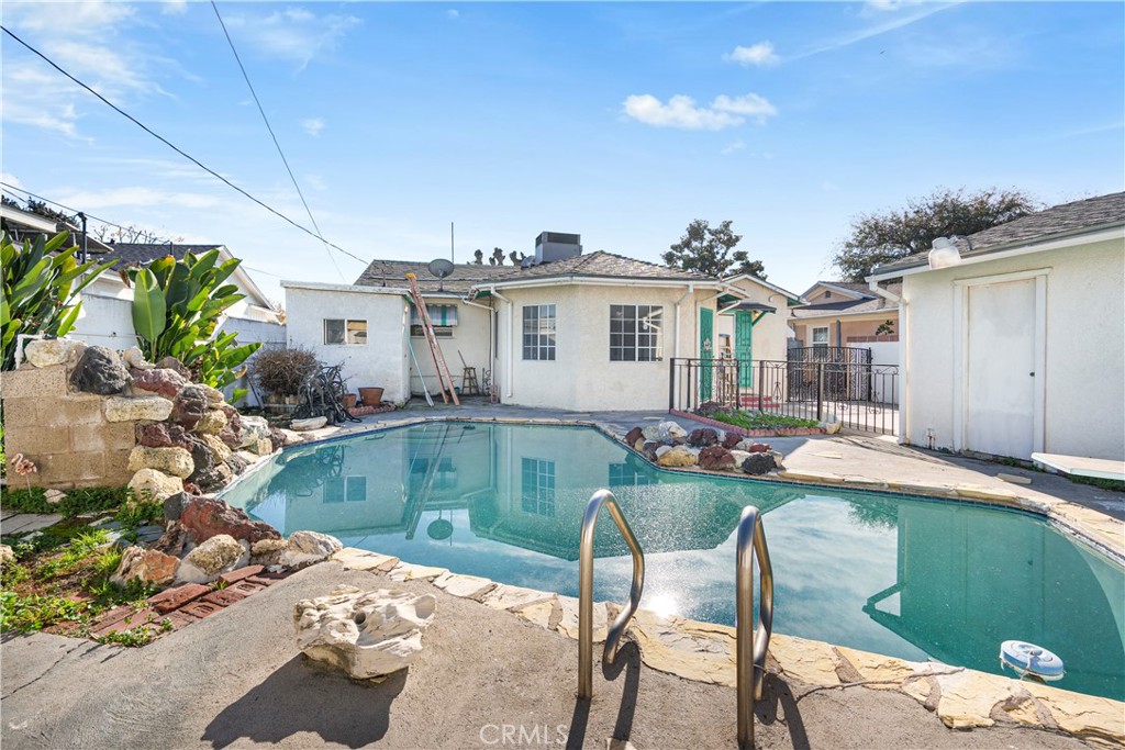 10531 Mulhall Street El Monte, CA 91731 - Photo 12 of 13 a view of a house with backyard sitting area and swimming pool