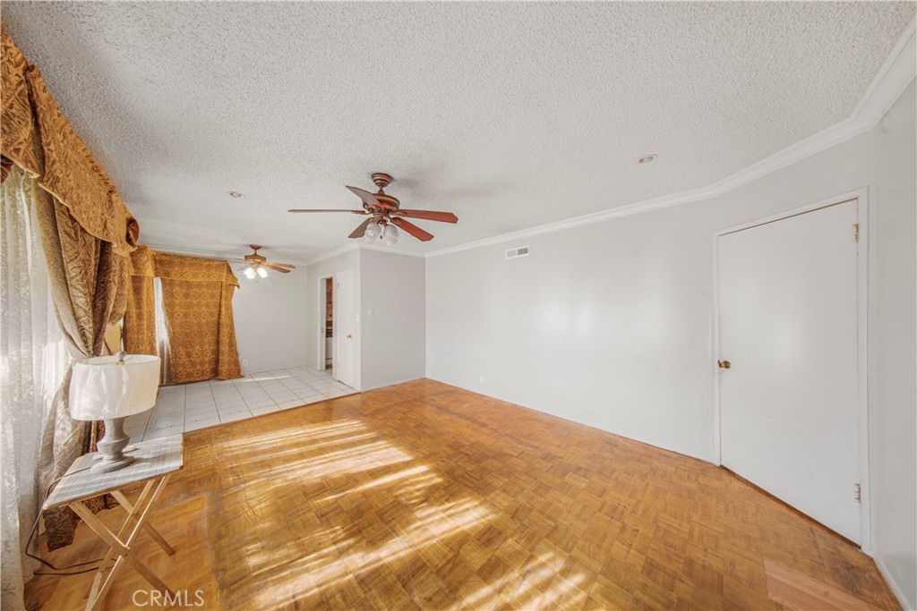10531 Mulhall Street El Monte, CA 91731 - Photo 3 of 13 a bedroom with a bed and a walk in closet