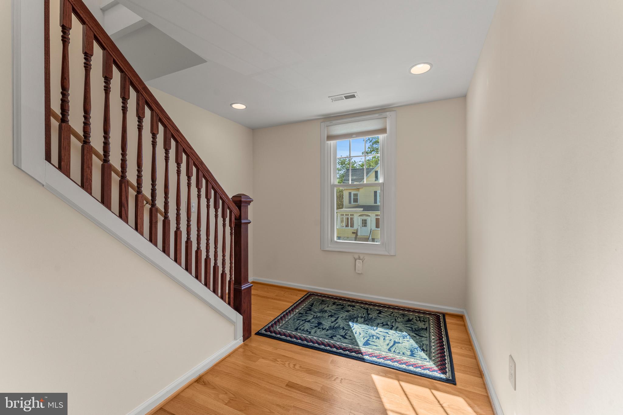 5012 Catalpha Road Baltimore, MD 21214 - Photo 20 of 44 a view of stair with an entryway