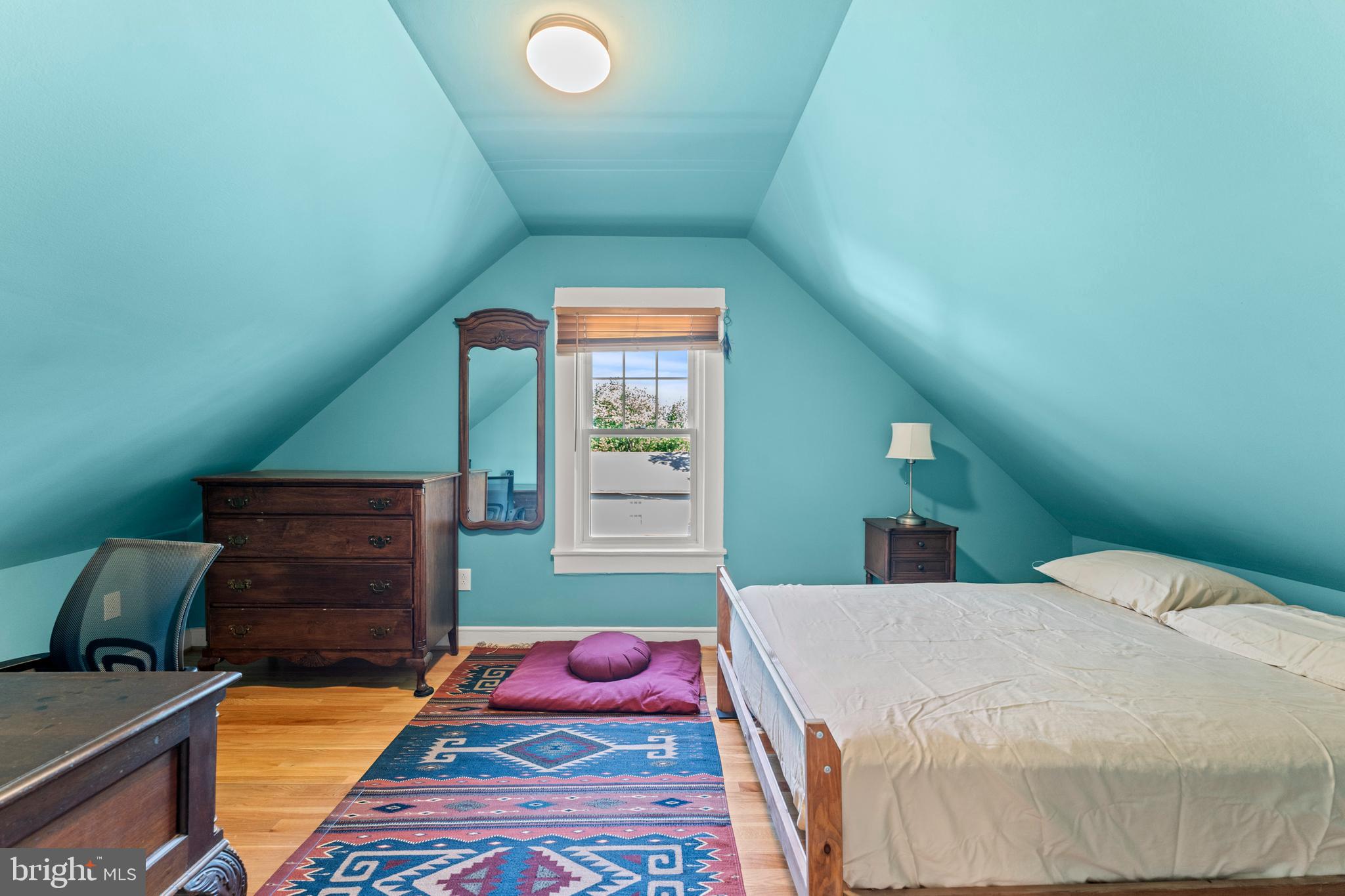 5012 Catalpha Road Baltimore, MD 21214 - Photo 28 of 44 a bedroom with a bed and a dresser