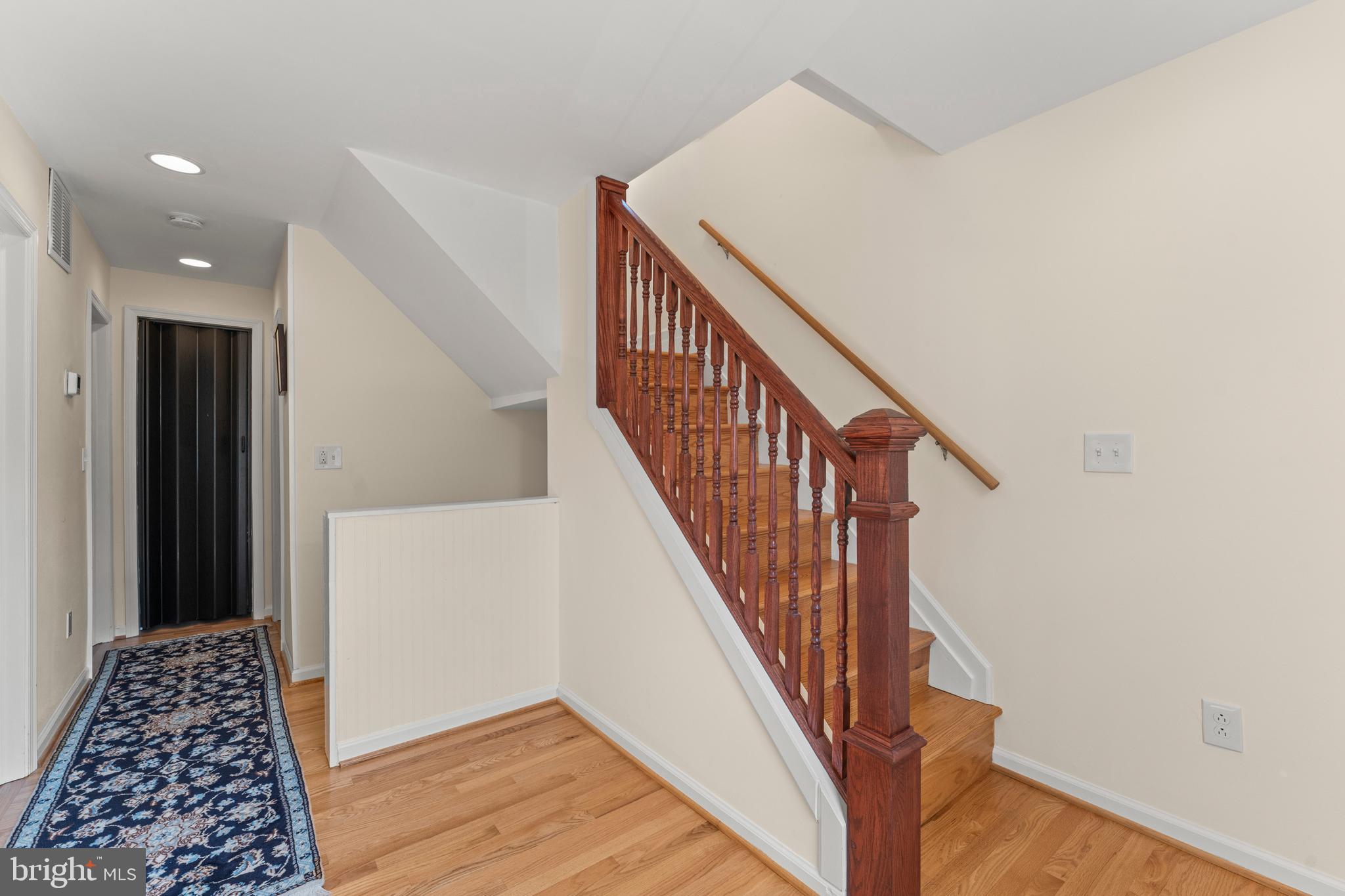 5012 Catalpha Road Baltimore, MD 21214 - Photo 31 of 44 a view of entryway with wooden floor