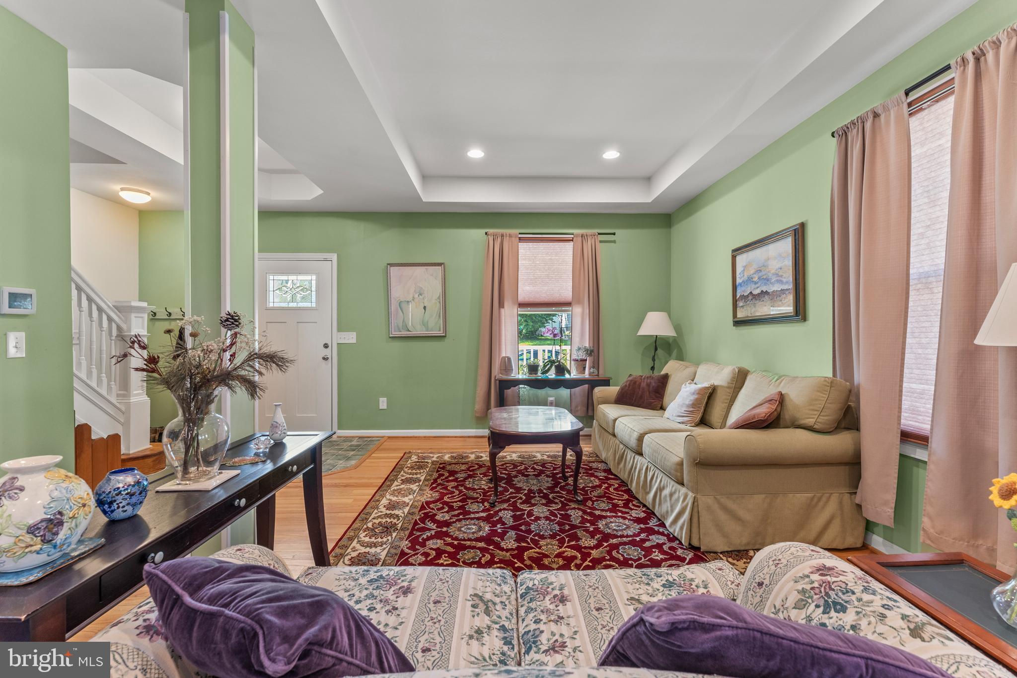 5012 Catalpha Road Baltimore, MD 21214 - Photo 5 of 44 a living room with furniture and a rug