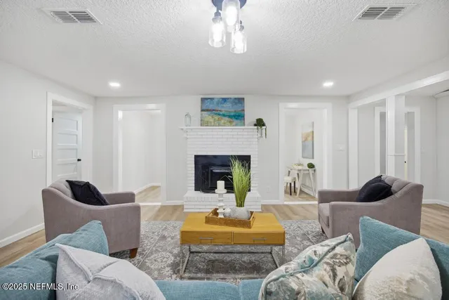 a view of deck with wooden floor and trees