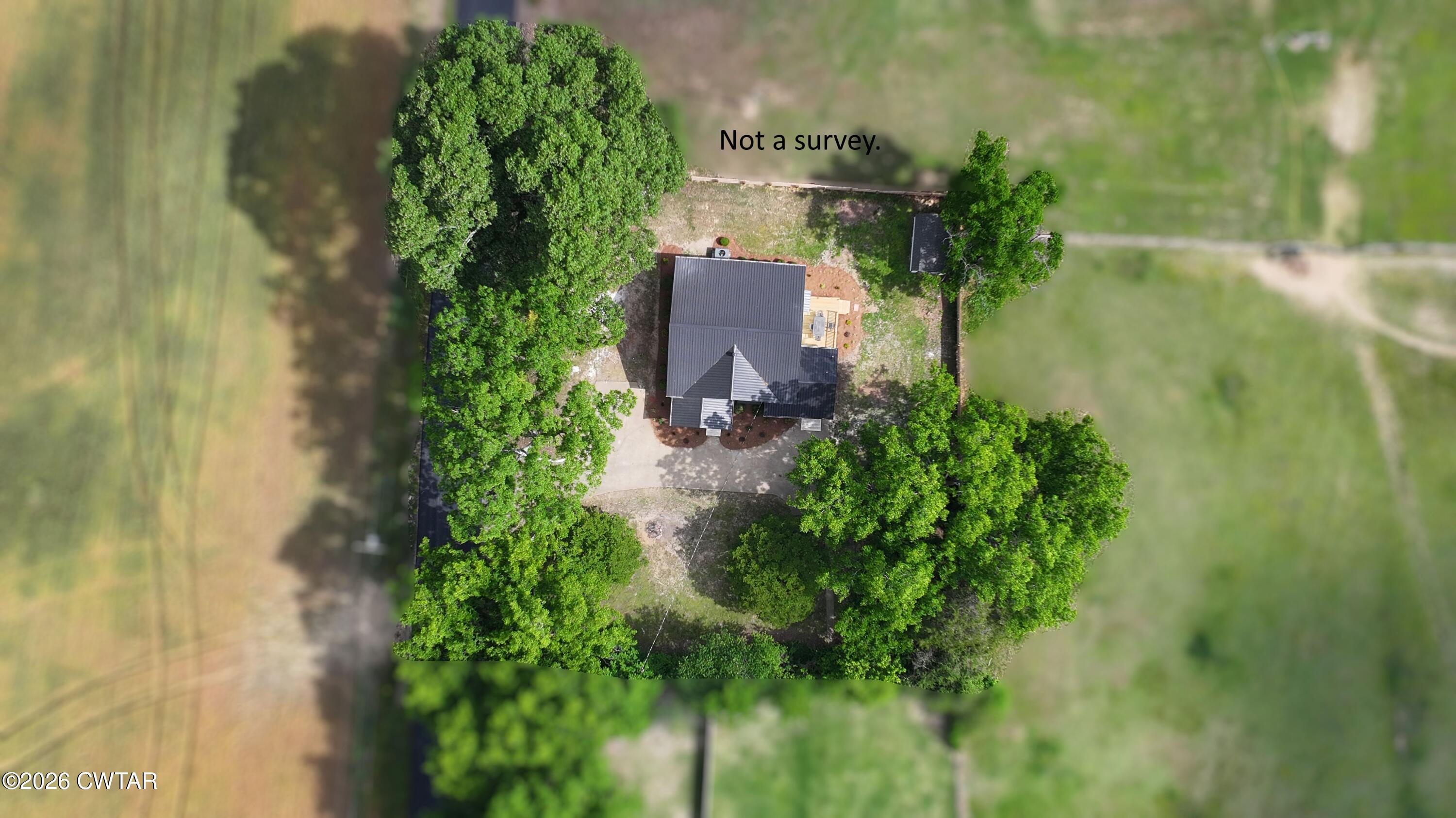 16 Manner Frank Road Milan, TN 38358 - Photo 25 of 25 an aerial view of a residential houses with outdoor space and trees