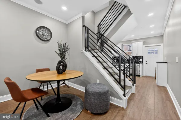 a kitchen with granite countertop a stove and a refrigerator