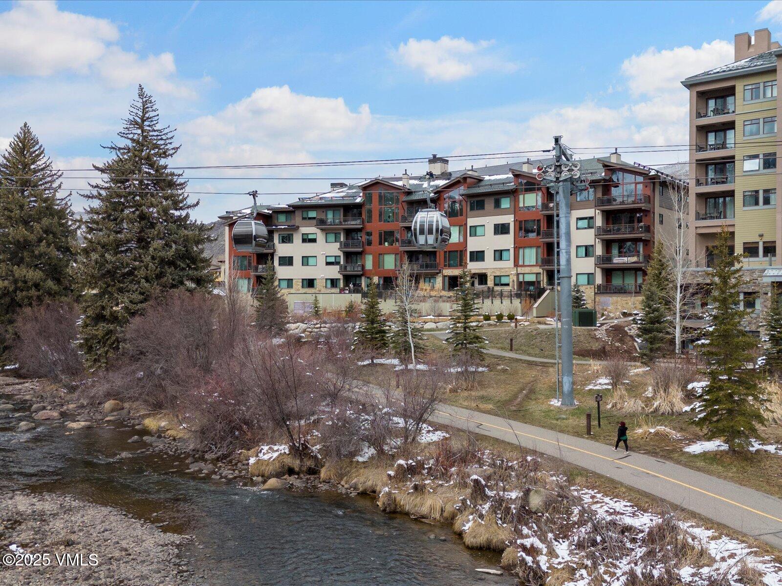 1 Waterfront Way, Unit 204 Avon, CO 81620 - Photo 33 of 38 a view of a city with tall buildings
