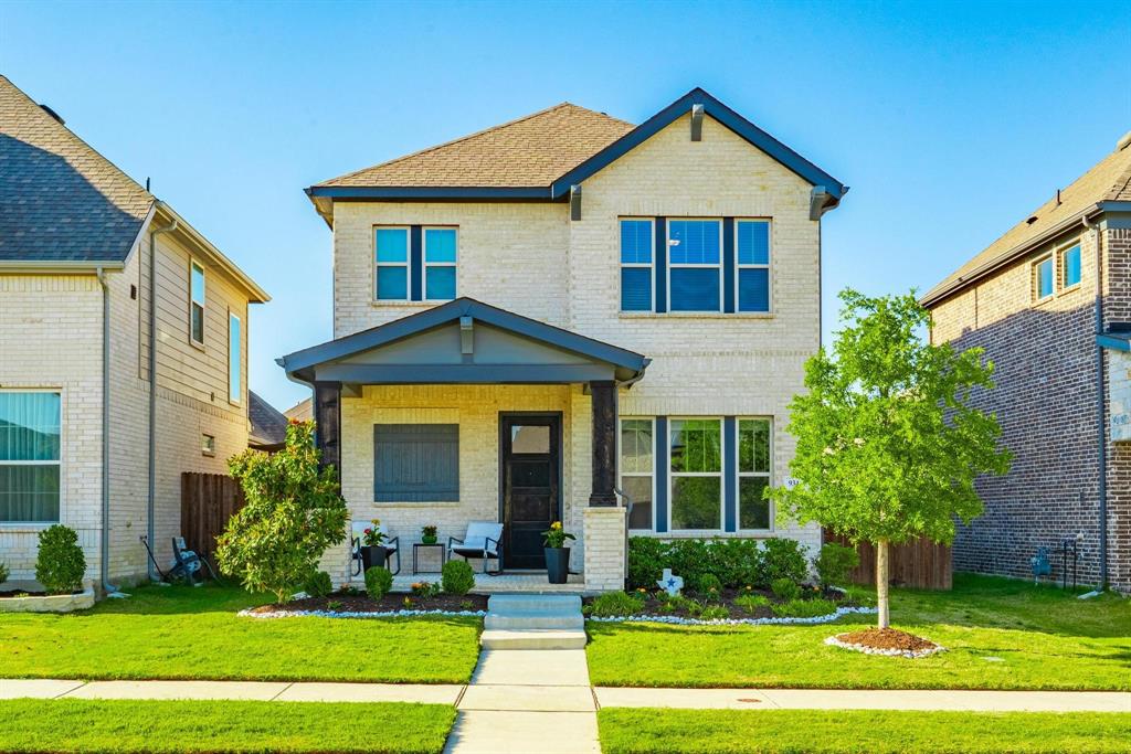 9341 Loggerhead Way Fort Worth, TX 76118 - Photo 4 of 35 Two-story residence featuring light-colored brick facade and a dark trim accent
