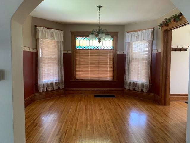 1311 Steward Road Steward, IL 60553 - Photo 10 of 62 a view of an empty room with wooden floor and a window