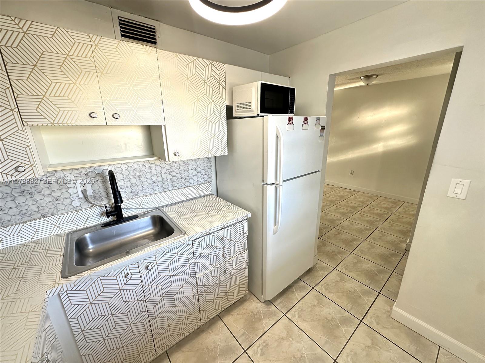 1725 West 60th Street, Unit F330 Hialeah, FL 33012 - Photo 6 of 16