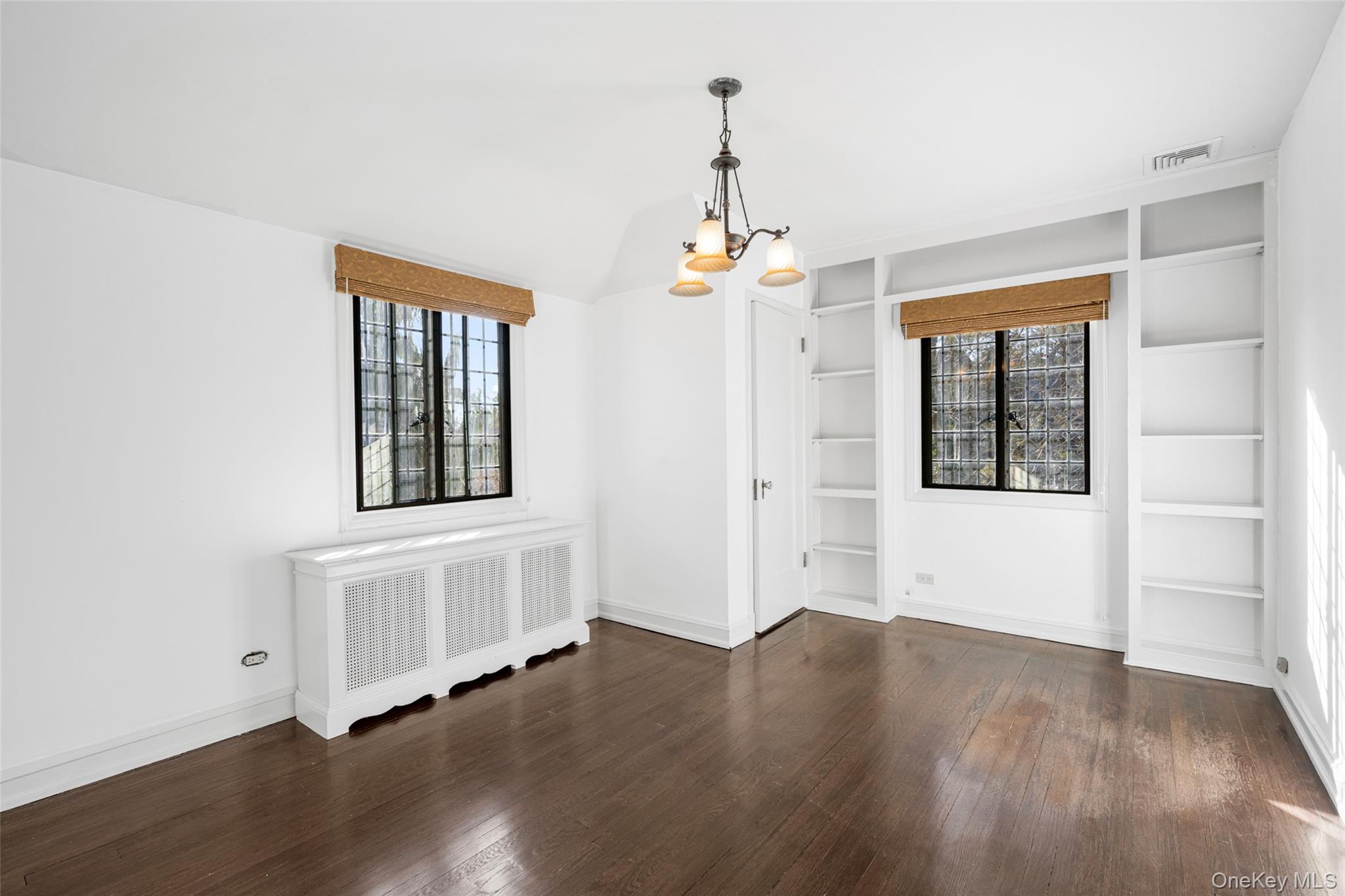 22 Verdun Avenue New Rochelle, NY 10804 - Photo 18 of 31 wooden floor in an empty room with a window