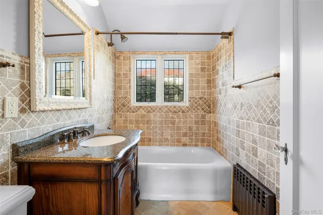 a bathroom with a sink and a bathtub