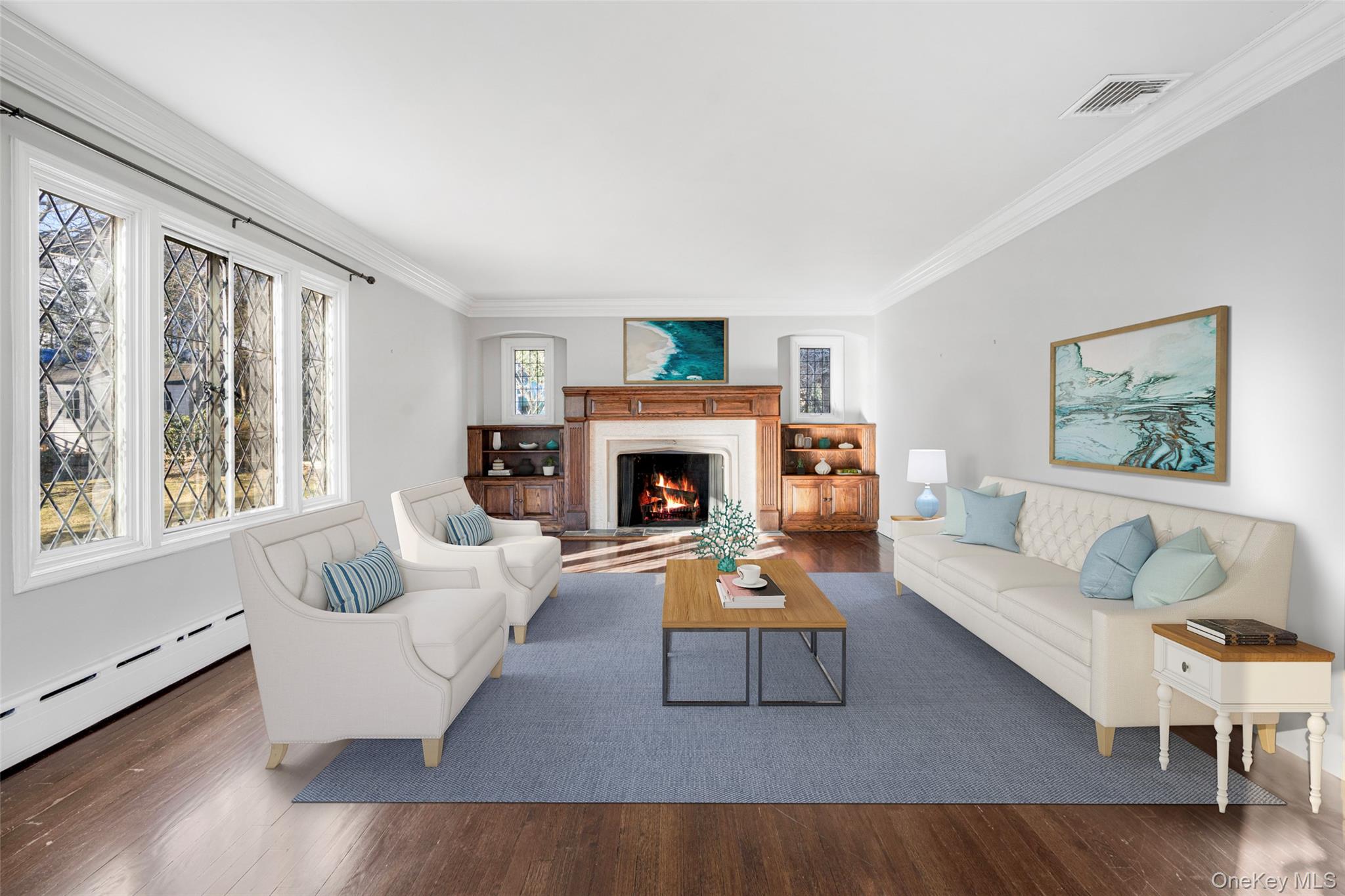22 Verdun Avenue New Rochelle, NY 10804 - Photo 3 of 31 a living room with furniture and a fireplace
