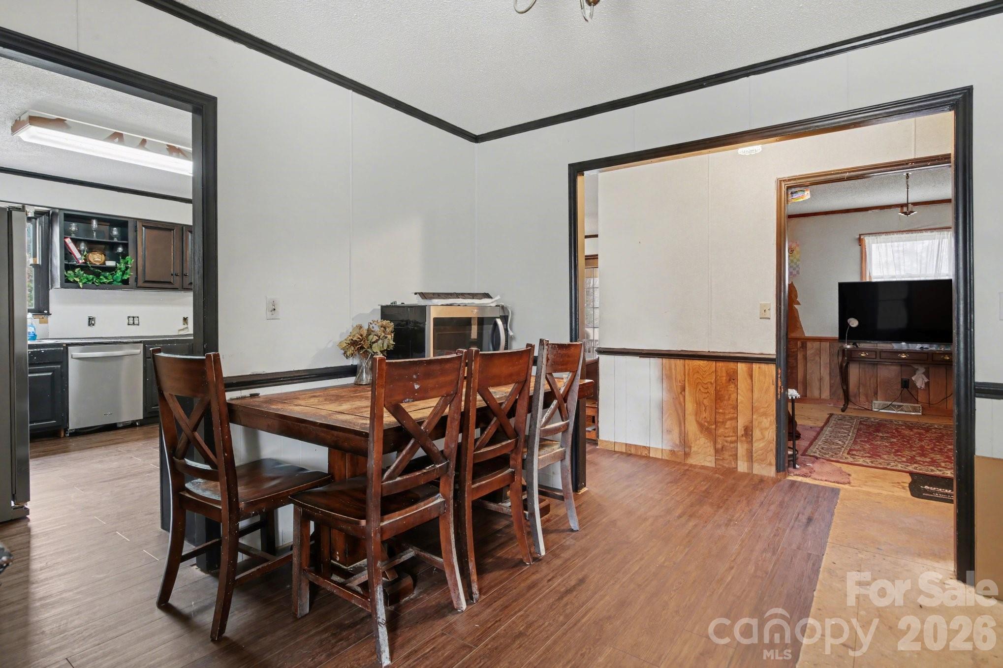 236 Tussey Road Lexington, NC 27295 - Photo 4 of 11 a view of a dining room with furniture and wooden floor