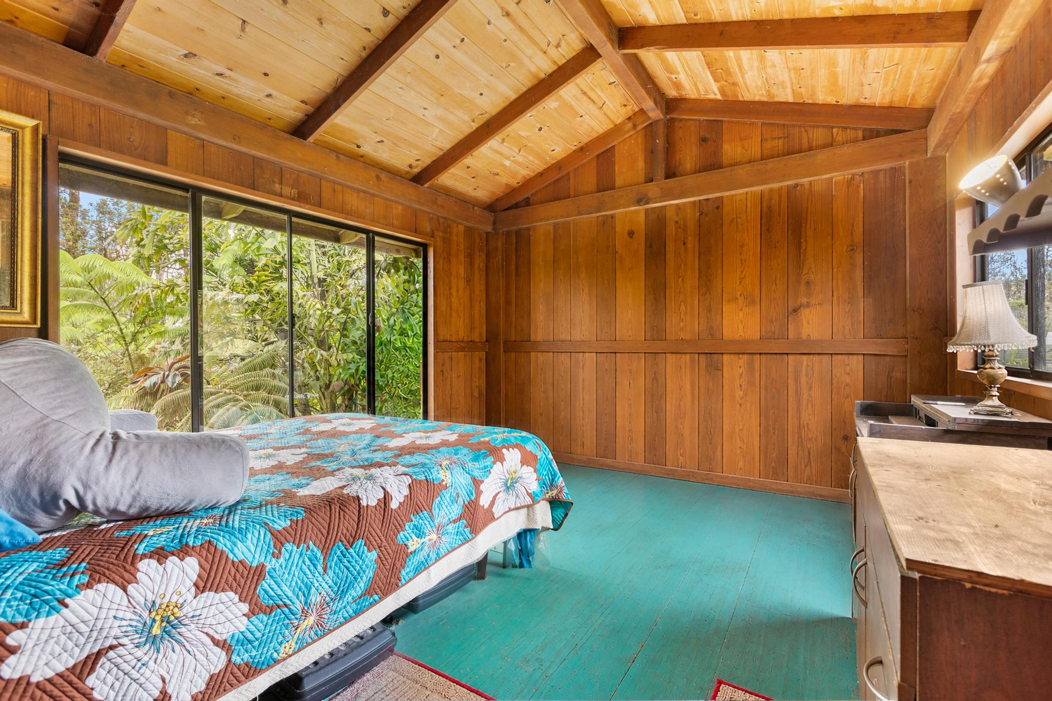 11-2897 Makoa Road Mountain View, HI 96771 - Photo 11 of 30 a bedroom with a bed and a dresser