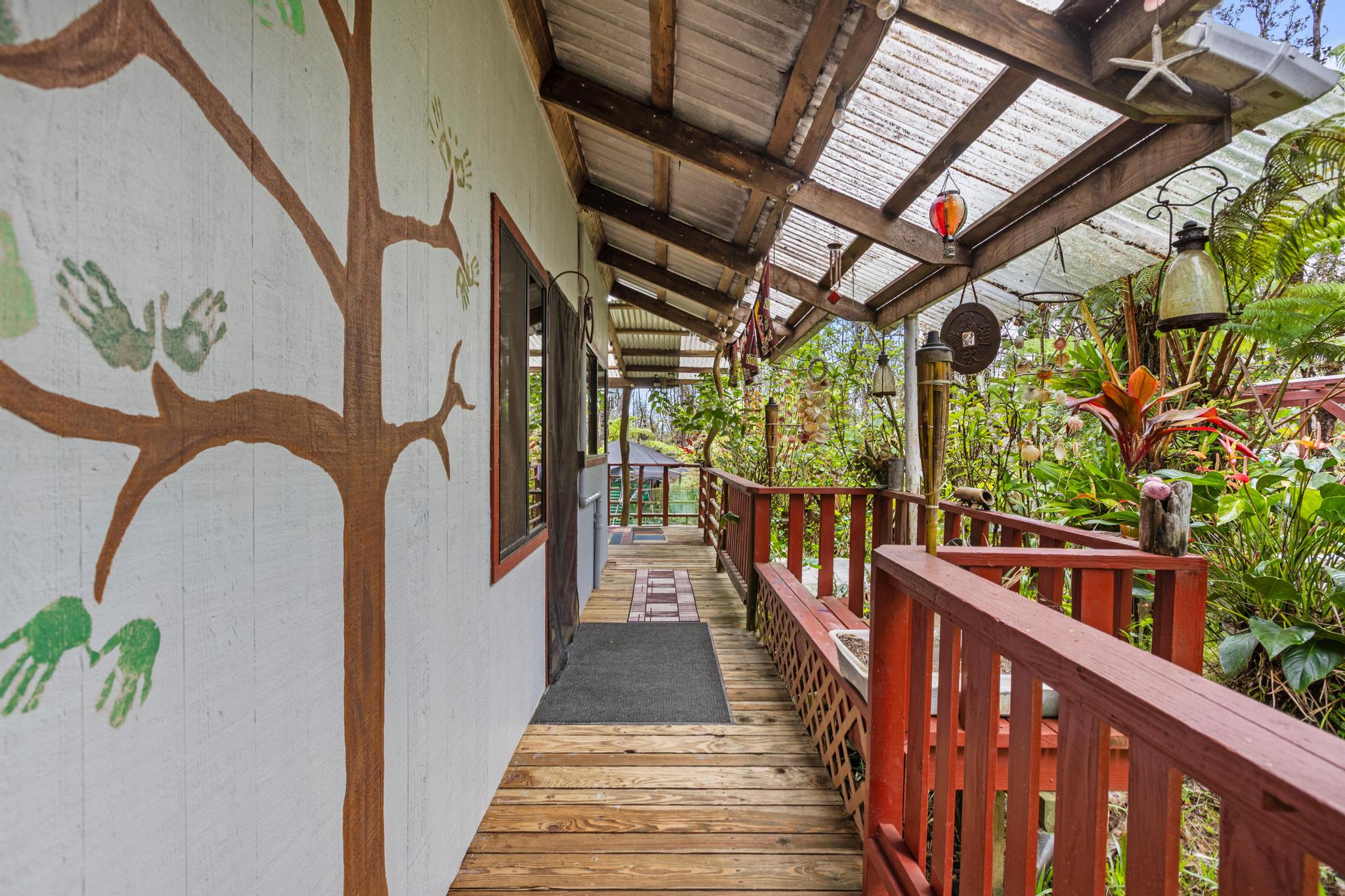 11-2897 Makoa Road Mountain View, HI 96771 - Photo 15 of 30 a view of a porch with wooden floor