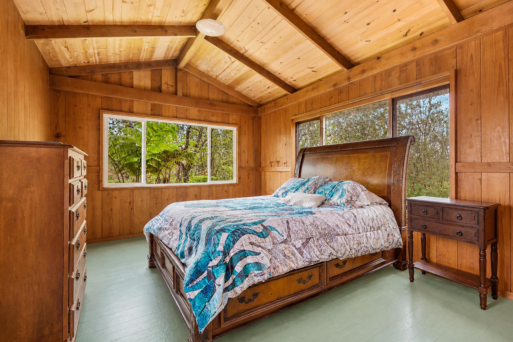 11-2897 Makoa Road Mountain View, HI 96771 - Photo 10 of 30 a bedroom with a bed and a window