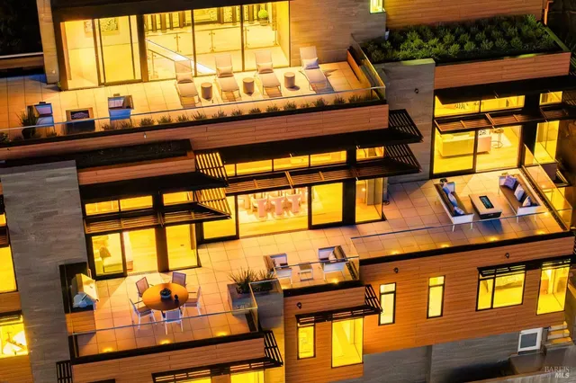 a view of a balcony with chair and table