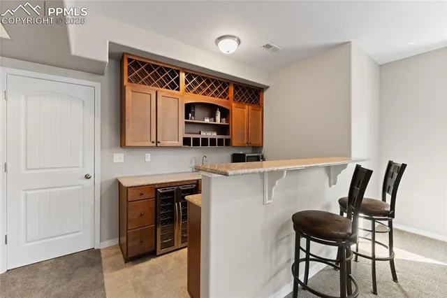 a kitchen with a stove and a microwave