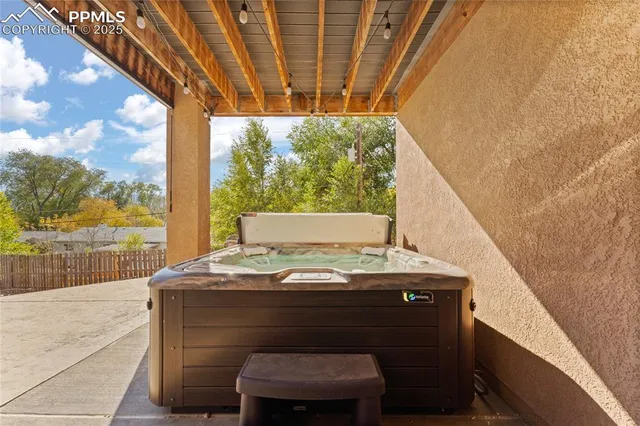 a view of balcony with furniture