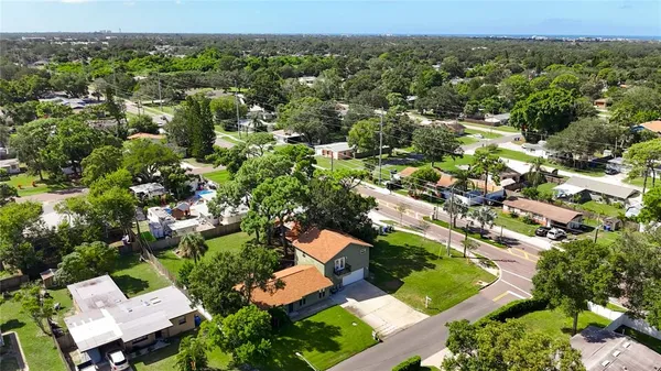an aerial view of residential house with outdoor space