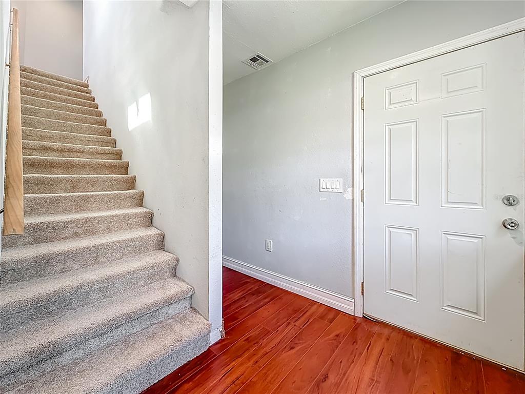 2372 18th Avenue Southwest Largo, FL 33774 - Photo 34 of 80 a view of an entryway with wooden floor