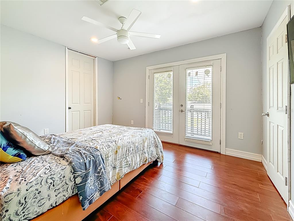 2372 18th Avenue Southwest Largo, FL 33774 - Photo 45 of 80 a bedroom with a large bed and a window