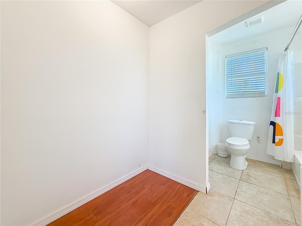 2372 18th Avenue Southwest Largo, FL 33774 - Photo 54 of 80 a bathroom with a toilet