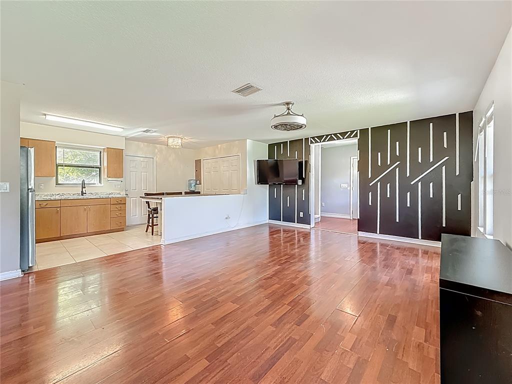 2372 18th Avenue Southwest Largo, FL 33774 - Photo 6 of 80 a view of a kitchen with wooden floor and a kitchen