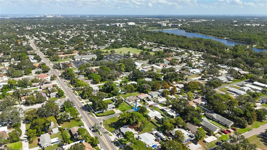 2372 18th Avenue Southwest Largo, FL 33774 - Photo 70 of 80 an aerial view of residential houses with outdoor space and trees