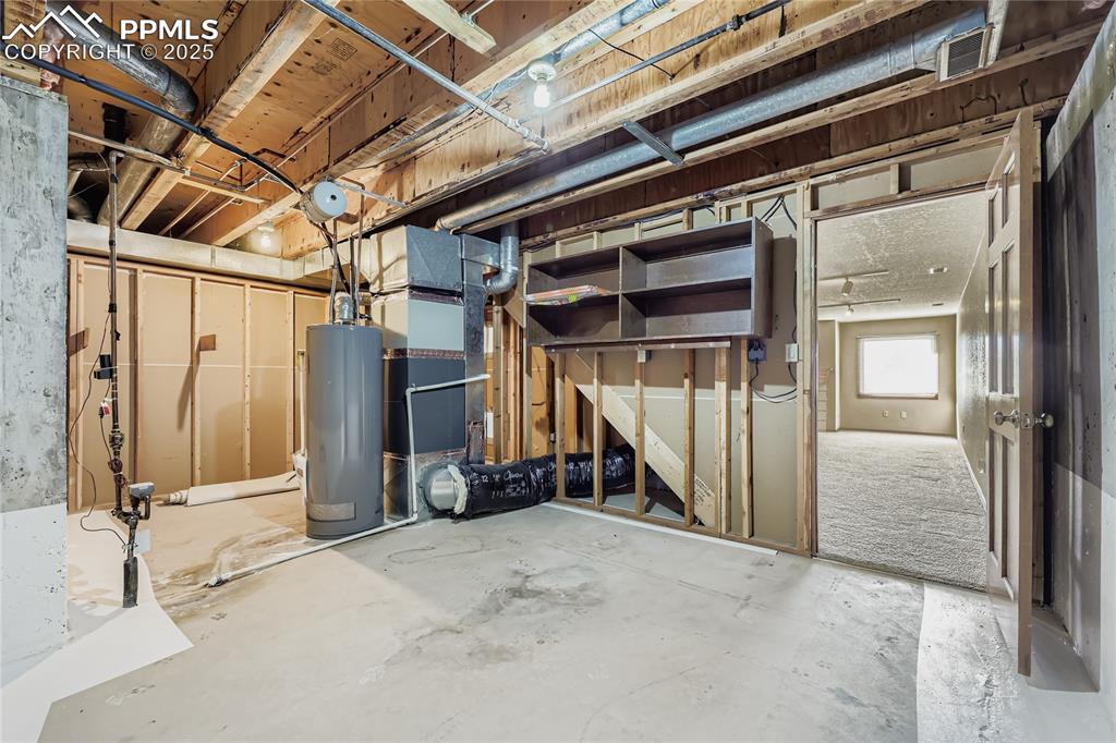 368 Mission Hill Way Colorado Springs, CO 80921 - Photo 33 of 39 a view of a room with wooden floor and windows