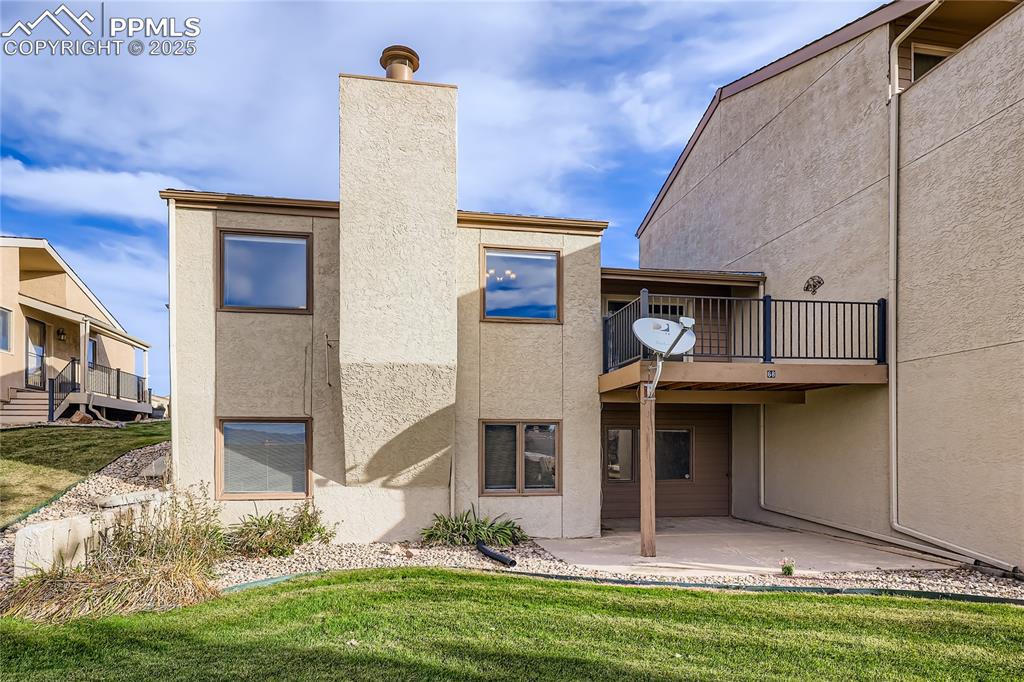 368 Mission Hill Way Colorado Springs, CO 80921 - Photo 35 of 39 a front view of a house with a yard