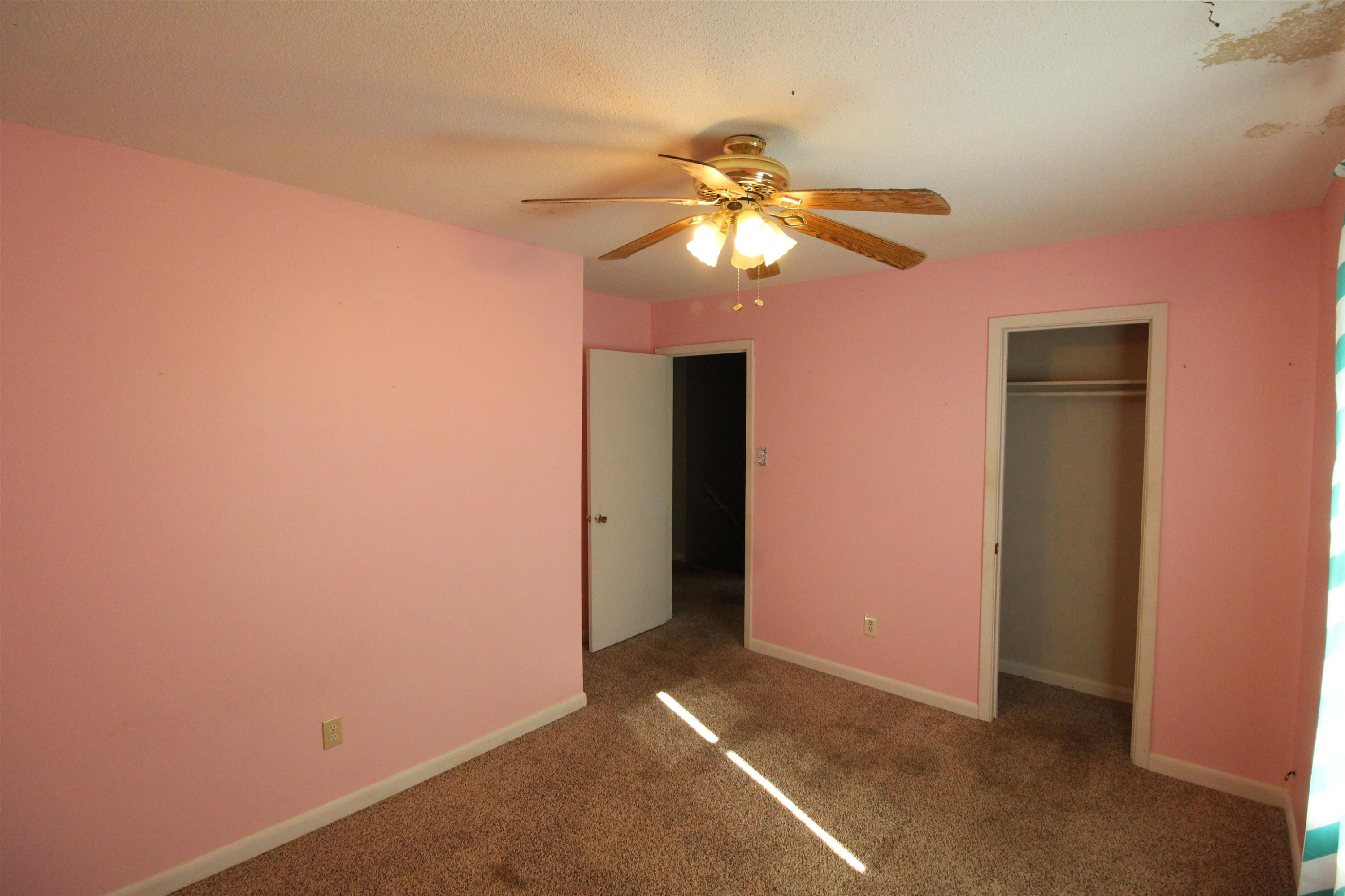410 Lowery Road Medon, TN 38356 - Photo 17 of 24 a view of an empty room with a fan