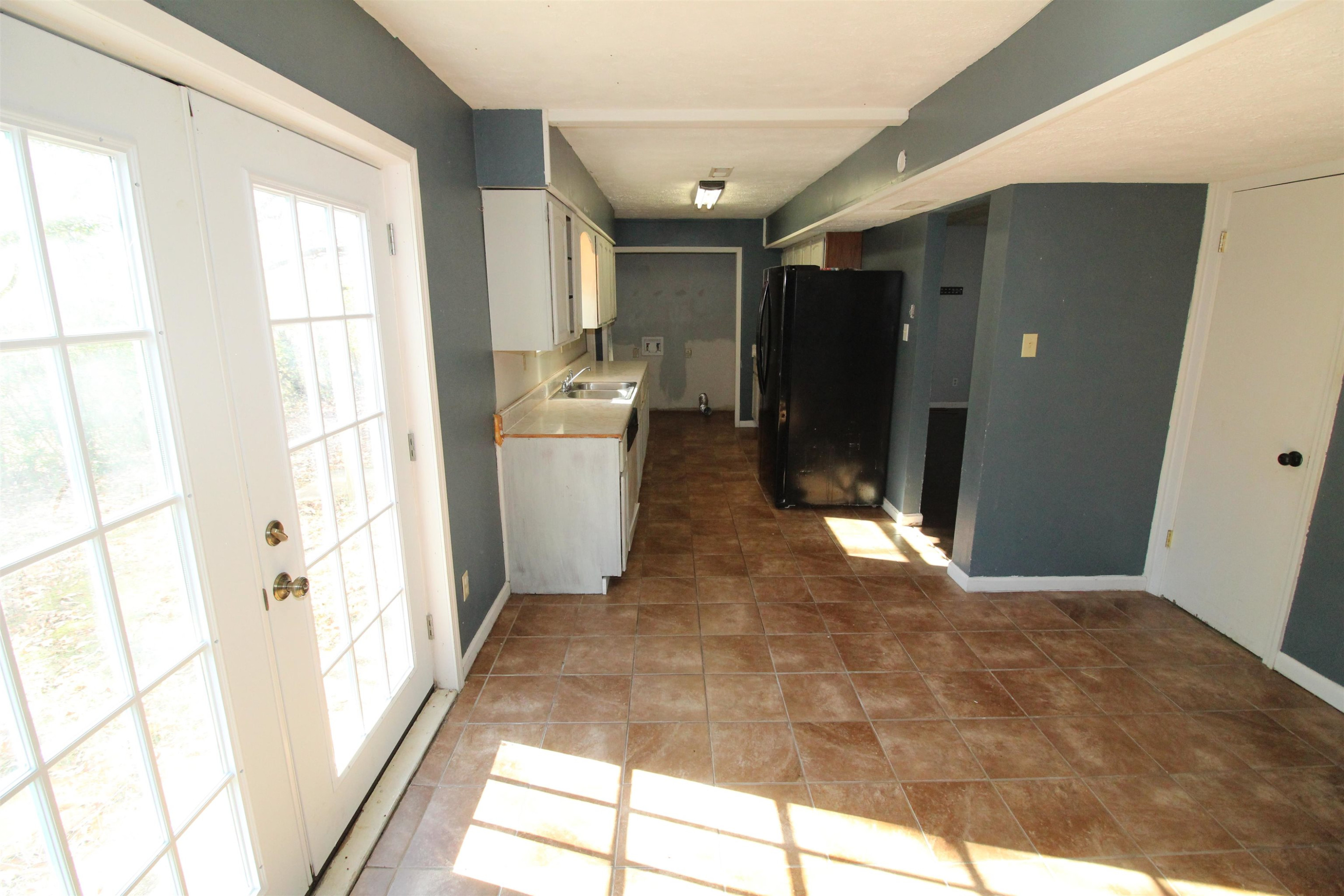 410 Lowery Road Medon, TN 38356 - Photo 6 of 24 a view of a bathroom with bathtub and shower