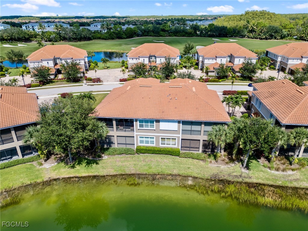 10260 Glastonbury Circle, Unit 102 Fort Myers, FL 33913 - Photo 36 of 44 an aerial view of a house with swimming pool garden and outdoor seating