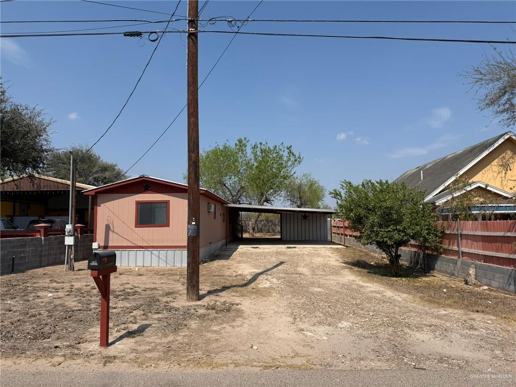 1814 Canyon Street Rio Grande City, TX 78582 - Photo 1 of 9 a view of a terrace with a bench
