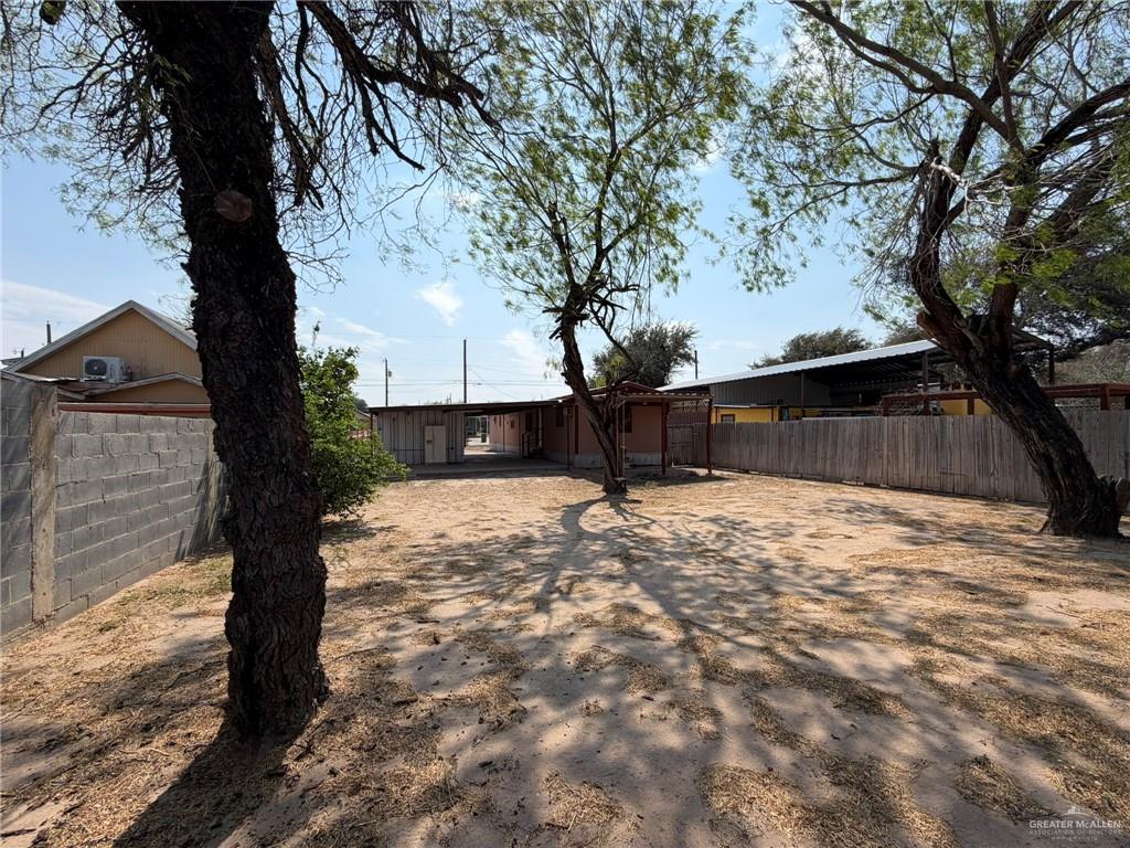 1814 Canyon Street Rio Grande City, TX 78582 - Photo 9 of 9 a street view with large trees