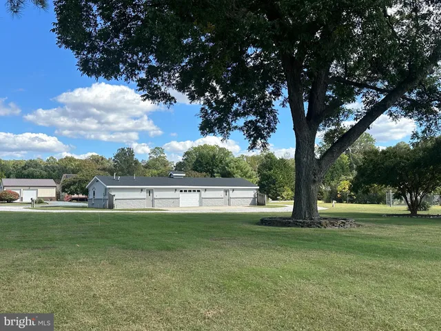 a view of a house with swimming pool