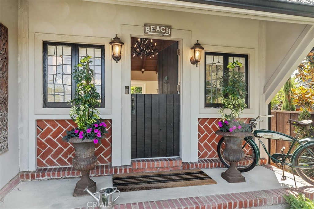 455 Brooks Street Laguna Beach, CA 92651 - Photo 4 of 32 a front view of a house with outdoor seating