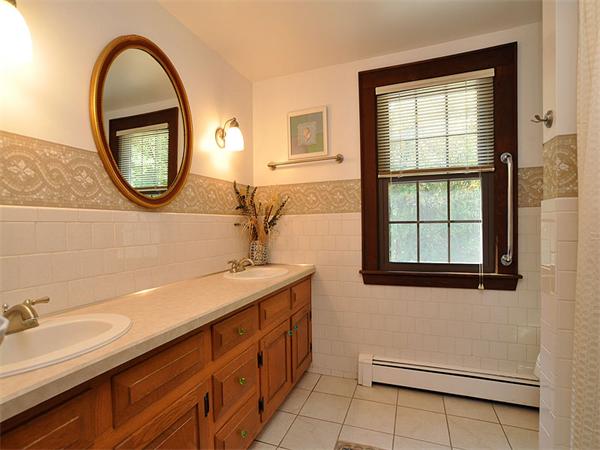 112 Prescott Road Boxborough, MA 01719 - Photo 16 of 30 a bathroom with a sink a mirror and a window