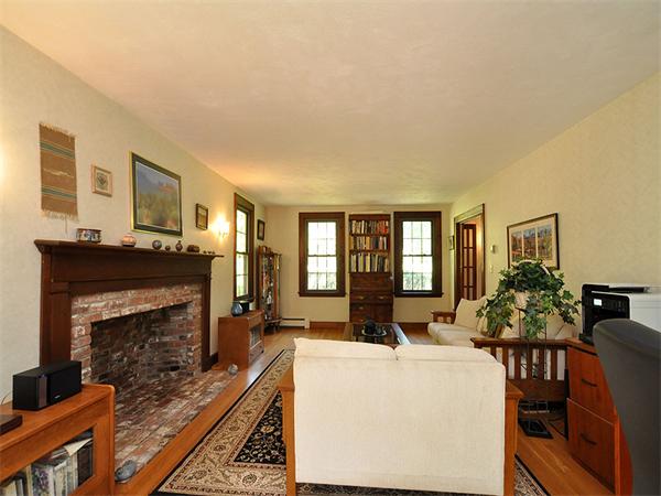 112 Prescott Road Boxborough, MA 01719 - Photo 4 of 30 a living room with furniture a fireplace and windows