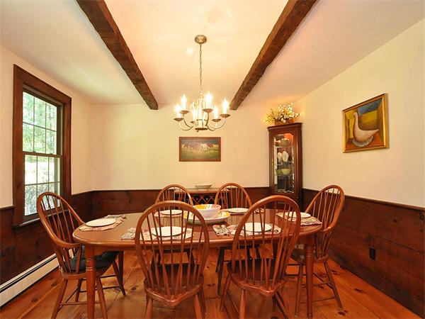 112 Prescott Road Boxborough, MA 01719 - Photo 5 of 30 a view of a dining room with furniture and chandelier