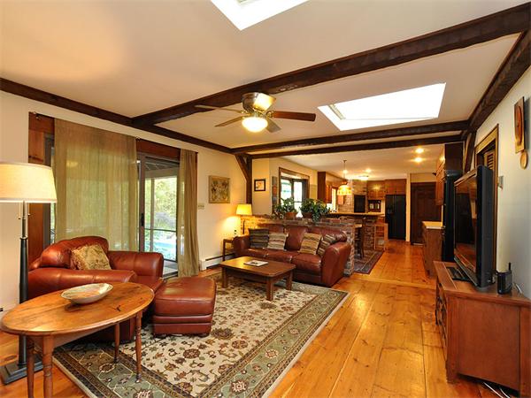 112 Prescott Road Boxborough, MA 01719 - Photo 10 of 30 a living room with furniture and a flat screen tv