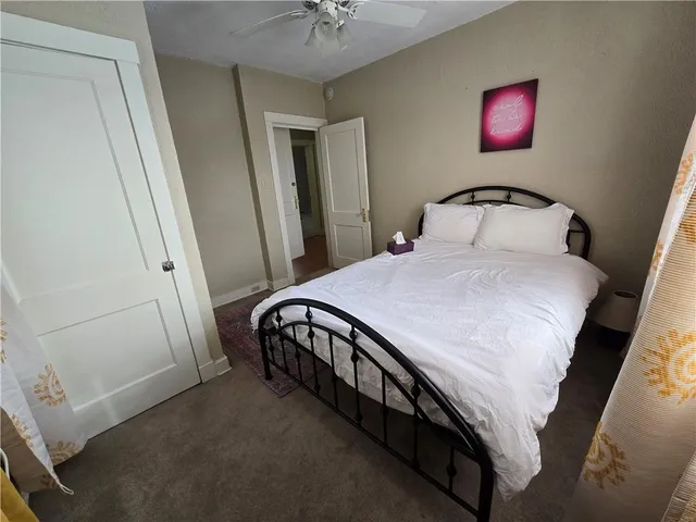 a bathroom with a glass door shower