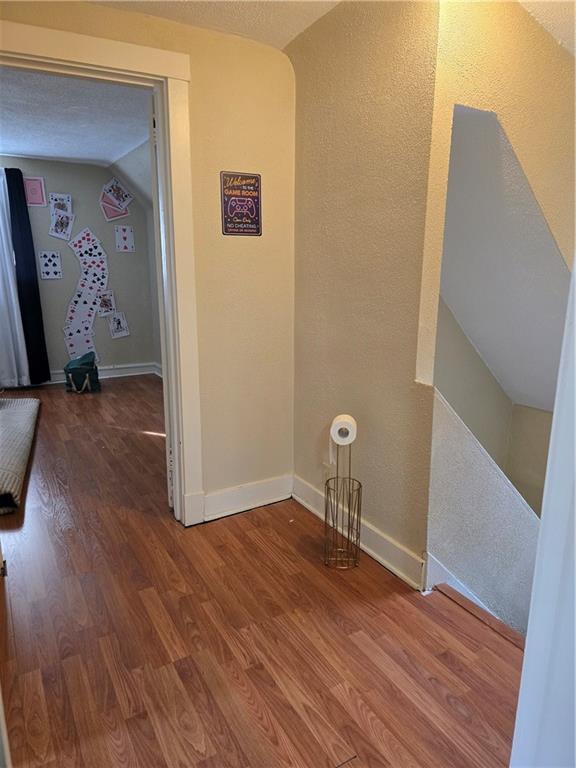 6501 Deary Street Pittsburgh, PA 15206 - Photo 30 of 47 a view of room with window and wooden floor