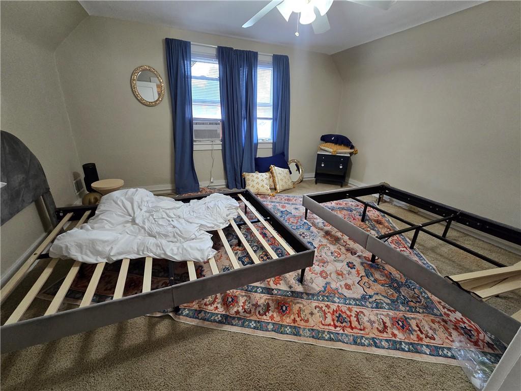 6501 Deary Street Pittsburgh, PA 15206 - Photo 33 of 47 a bedroom with a bed and a window