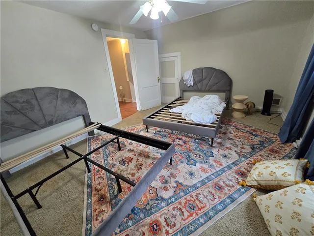 a bathroom with a glass shower door