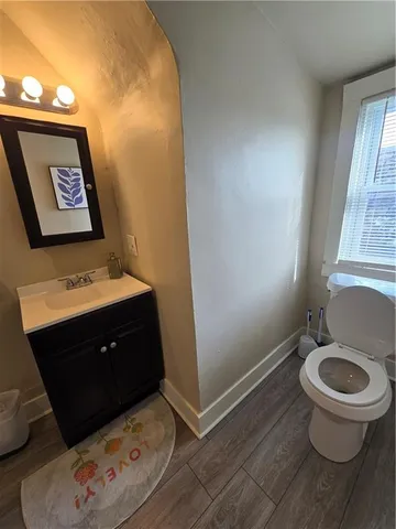 a bedroom with a bed and flat screen tv