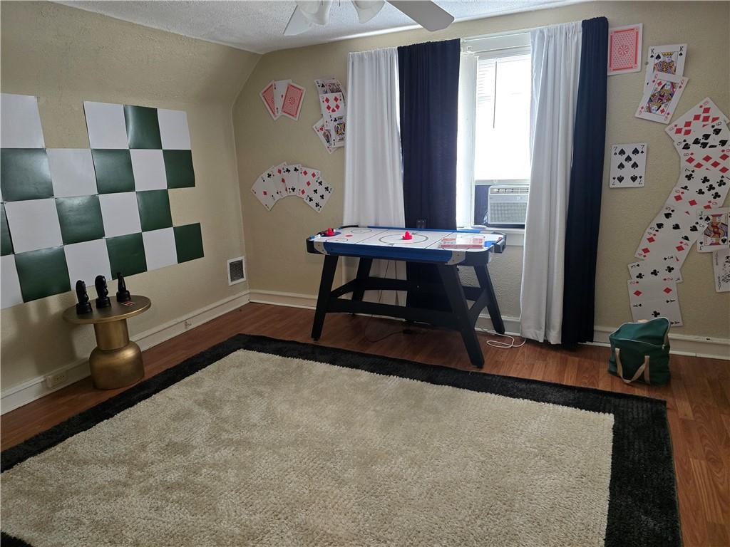 6501 Deary Street Pittsburgh, PA 15206 - Photo 38 of 47 a bedroom with furniture and a window